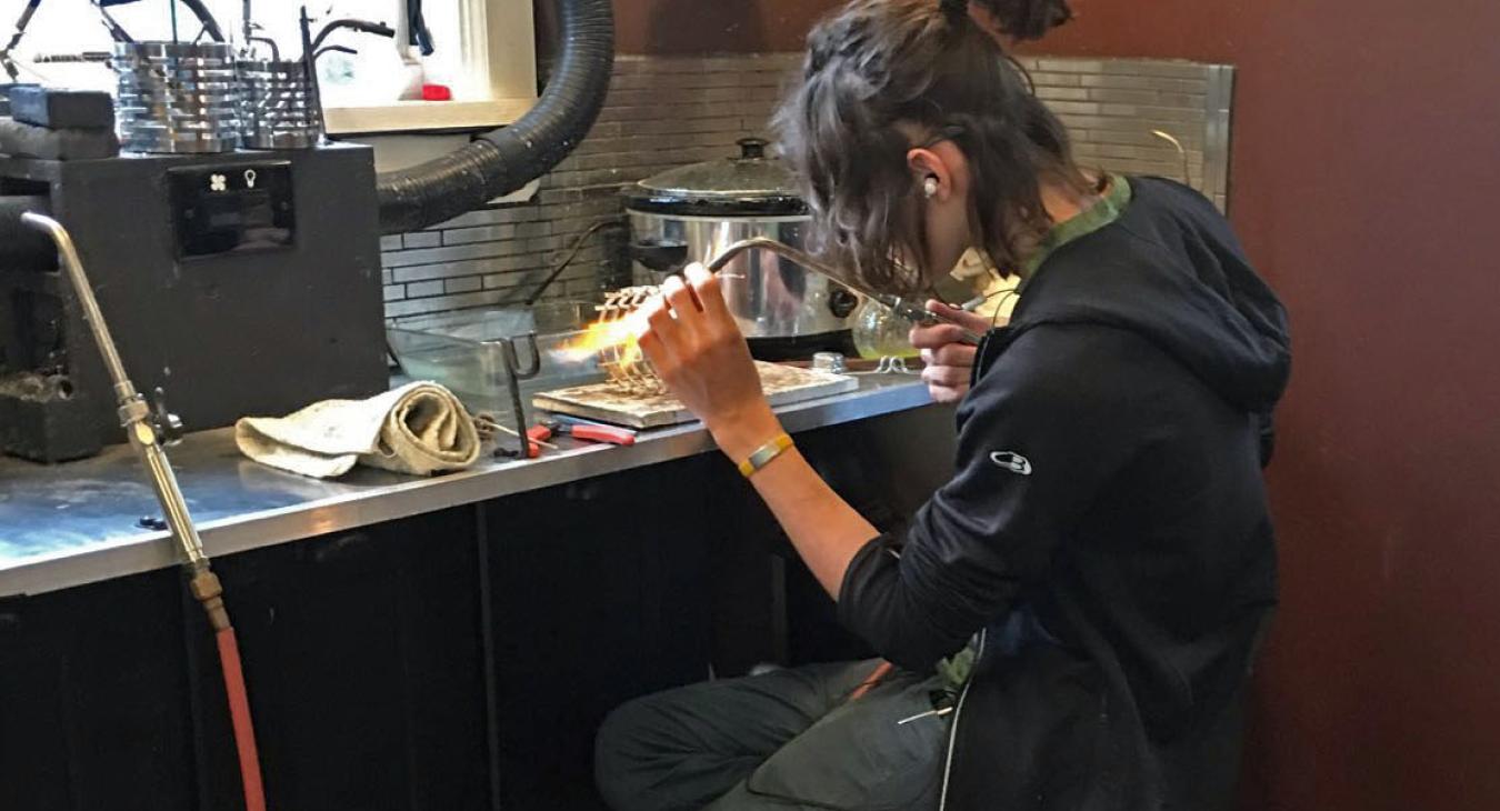 Louis soldering the teapot cage
