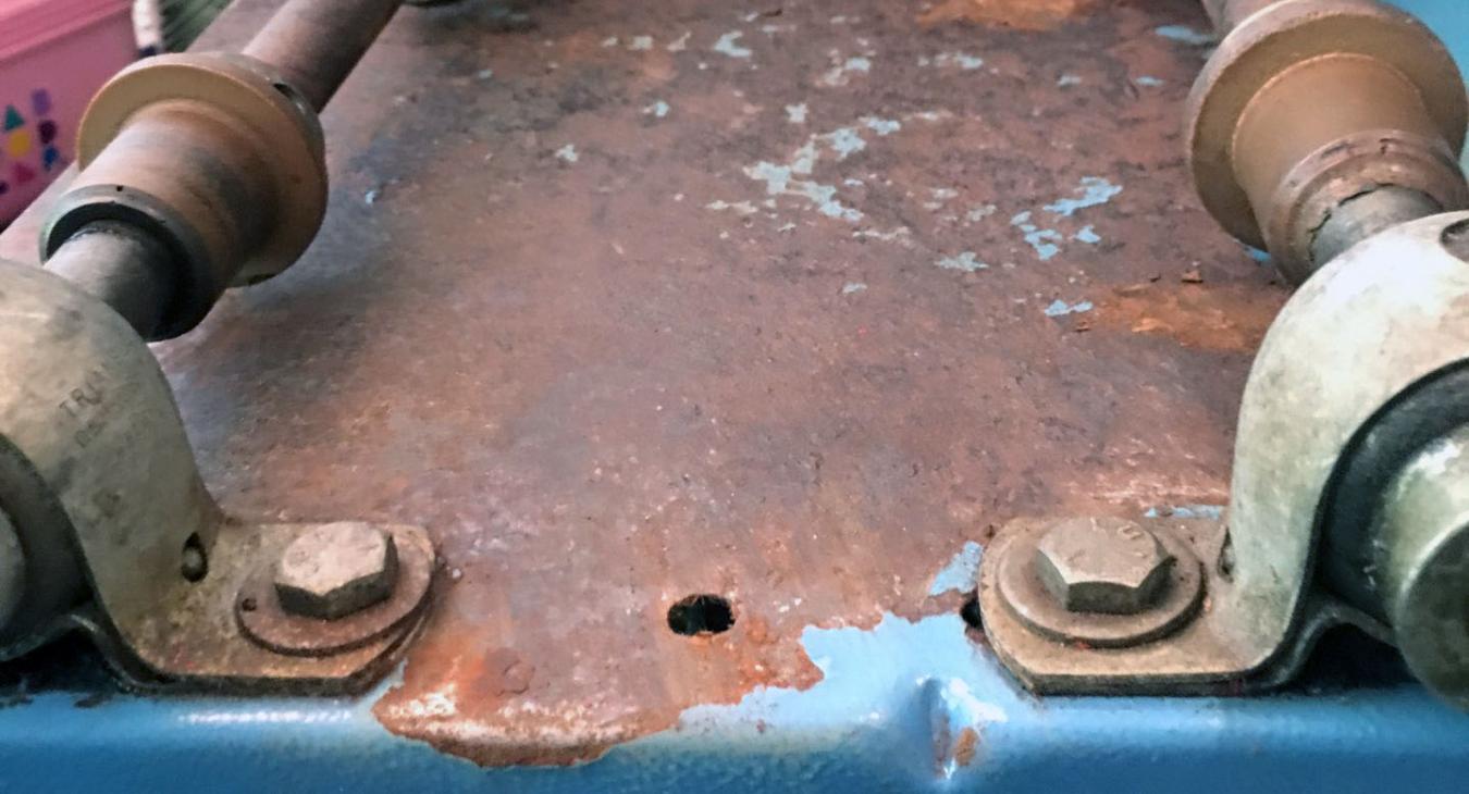 rusted tumbler with blue paint