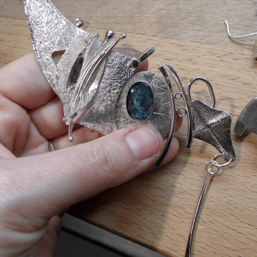 Holding the nearly finished piece