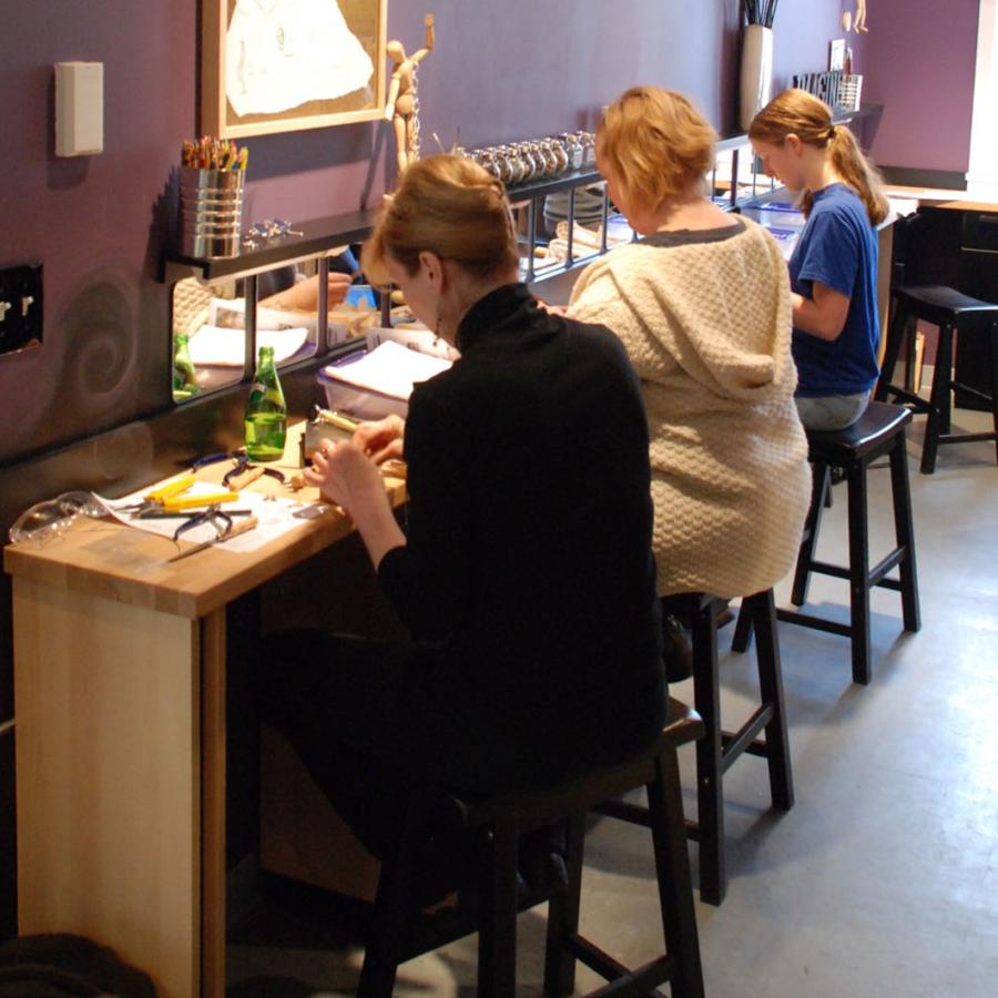 People talking a class at SilverWorks