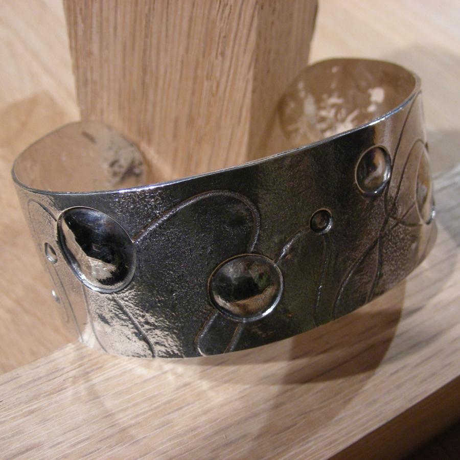 Textured silver cuff with etchings