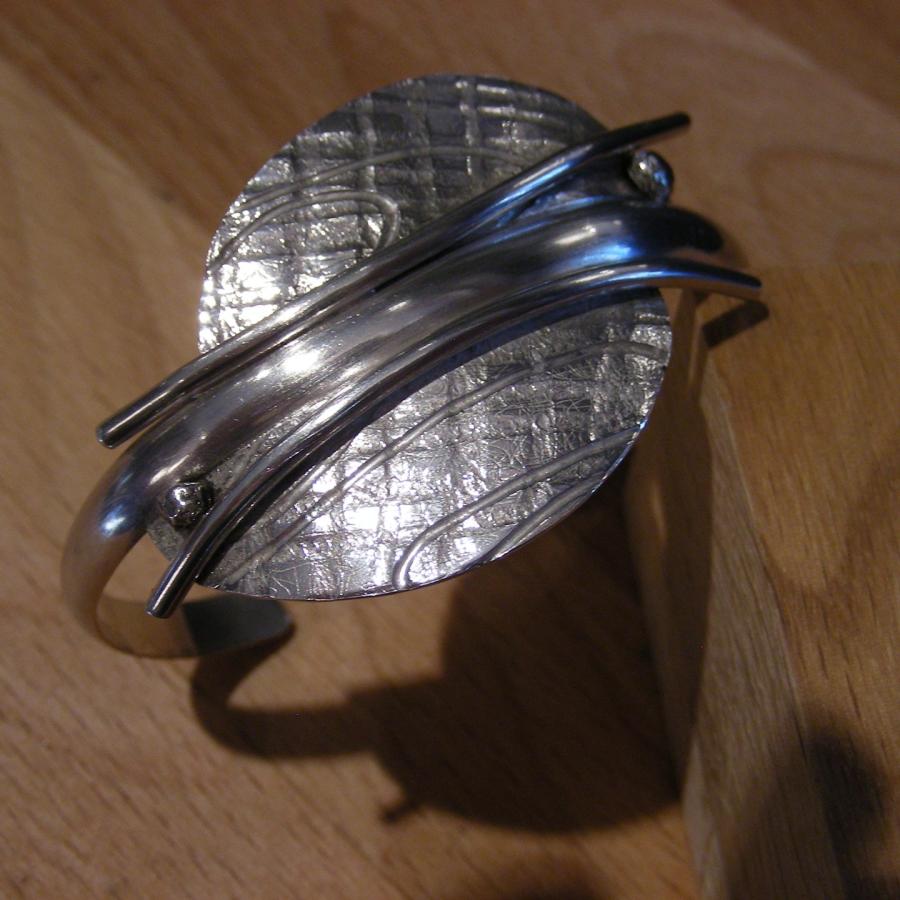 Textured silver and wire cuff