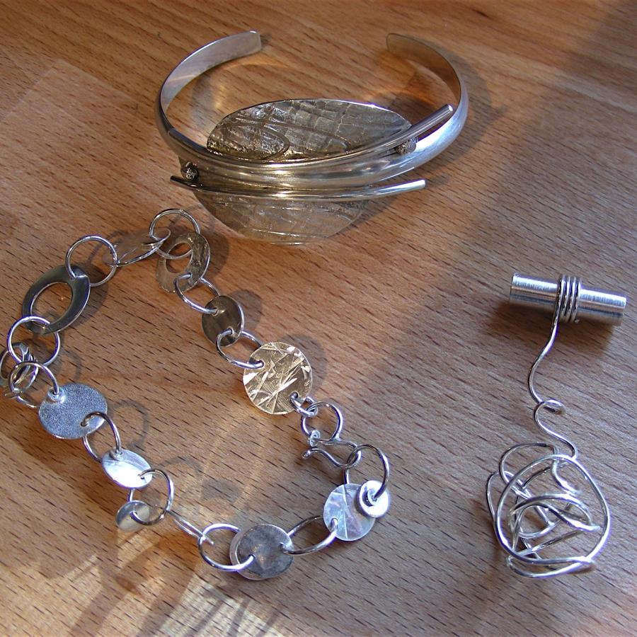 Silver cuff, silver link bracelet, and wire pendant