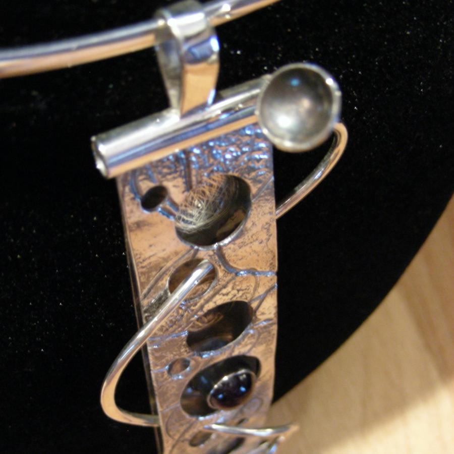 closeup of dapped cup on pendant