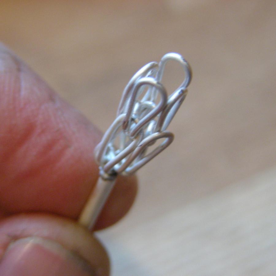 The beginning "sprout" of a woven chain