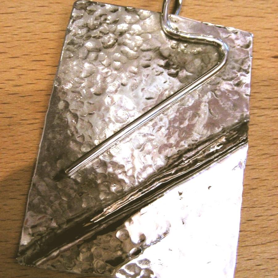 Hammered pendant with soldered wire by Nairi
