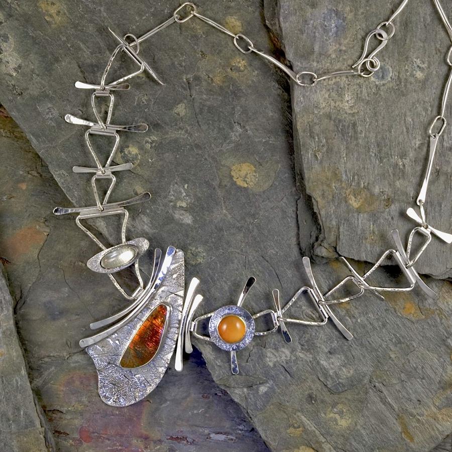 Silver necklace with ammolite, sunstone and moonstone