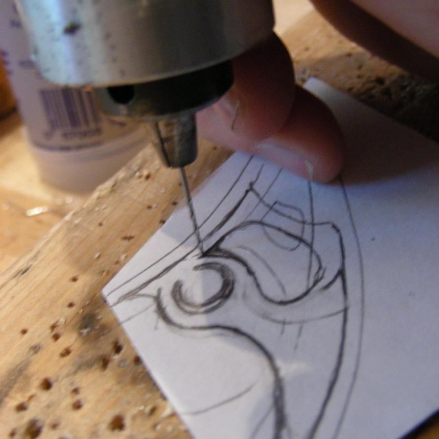 Drilling the hole for the saw blade.