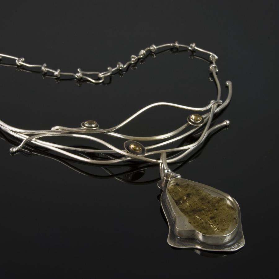 Silver wire necklace with rutilated quartz pendant