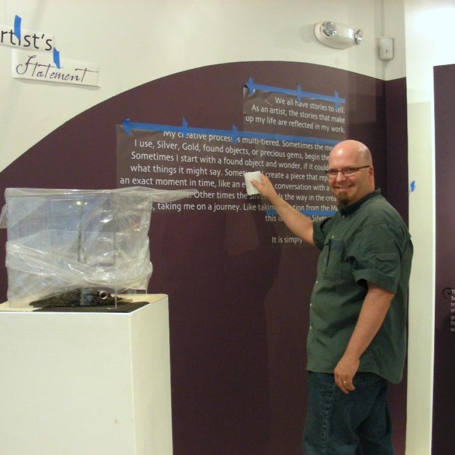 Bryan installing the vinyl text