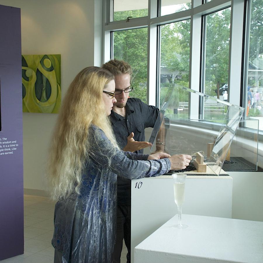 Blair and Daniel taking down a case display.