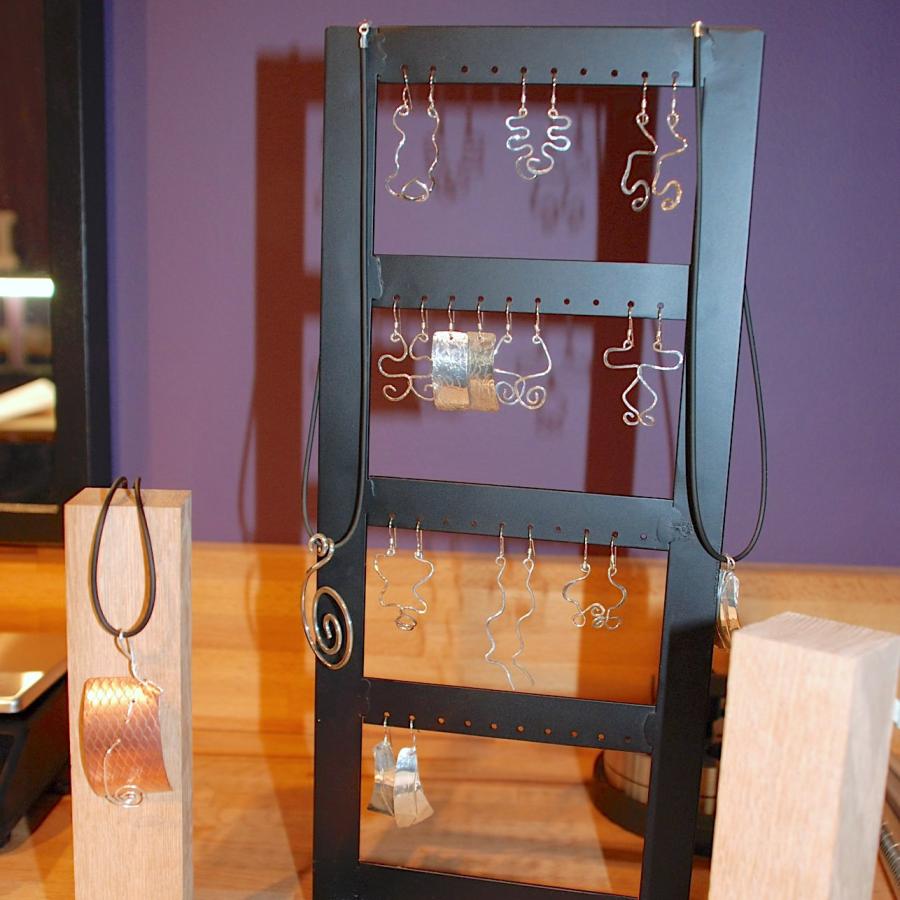 Student earrings on a rack