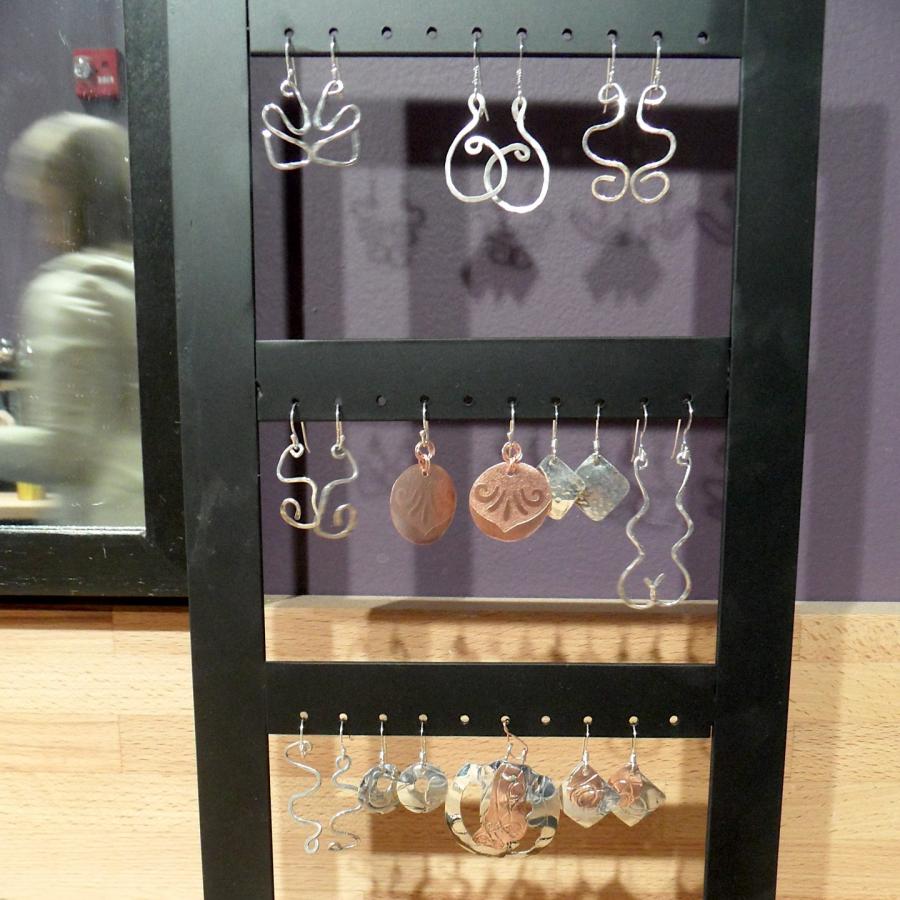 Student earrings on rack