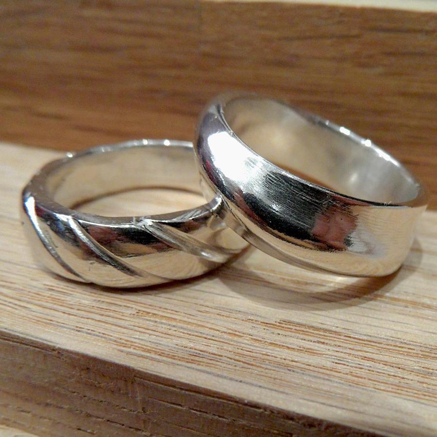 Two cast silver rings