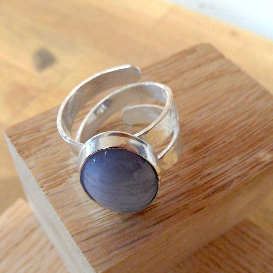 Silver ring with blue stone and swirl band