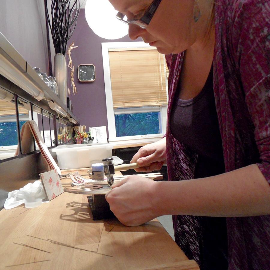 Blair shaping the piece as texture is applied