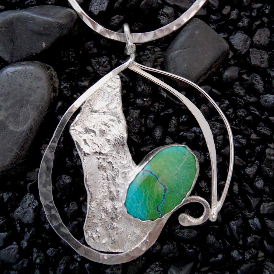 Textured silver wire and reticulation pendant with green stone