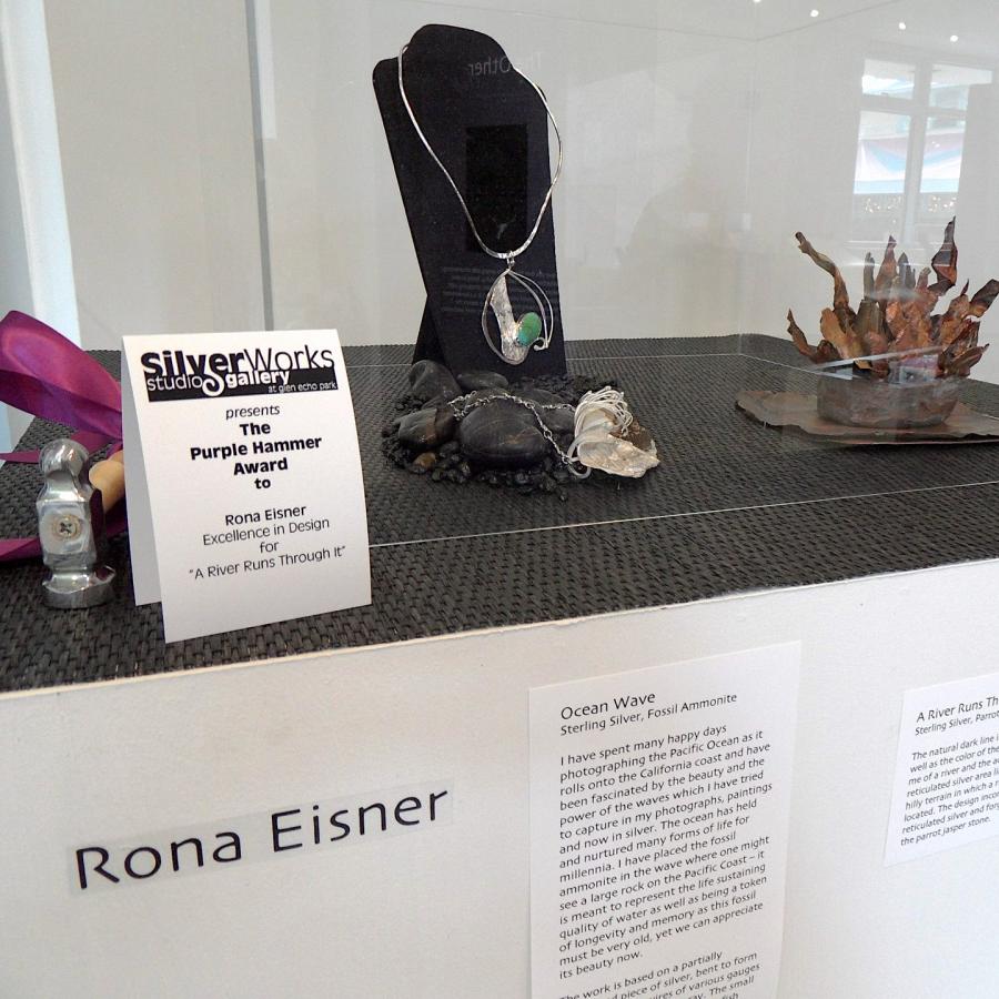 A collection of work by Rona Eisner on display