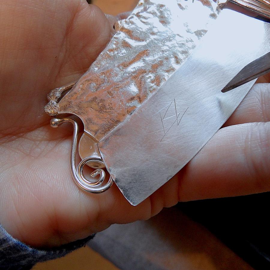 Hand signing “Shooting Star” pendant