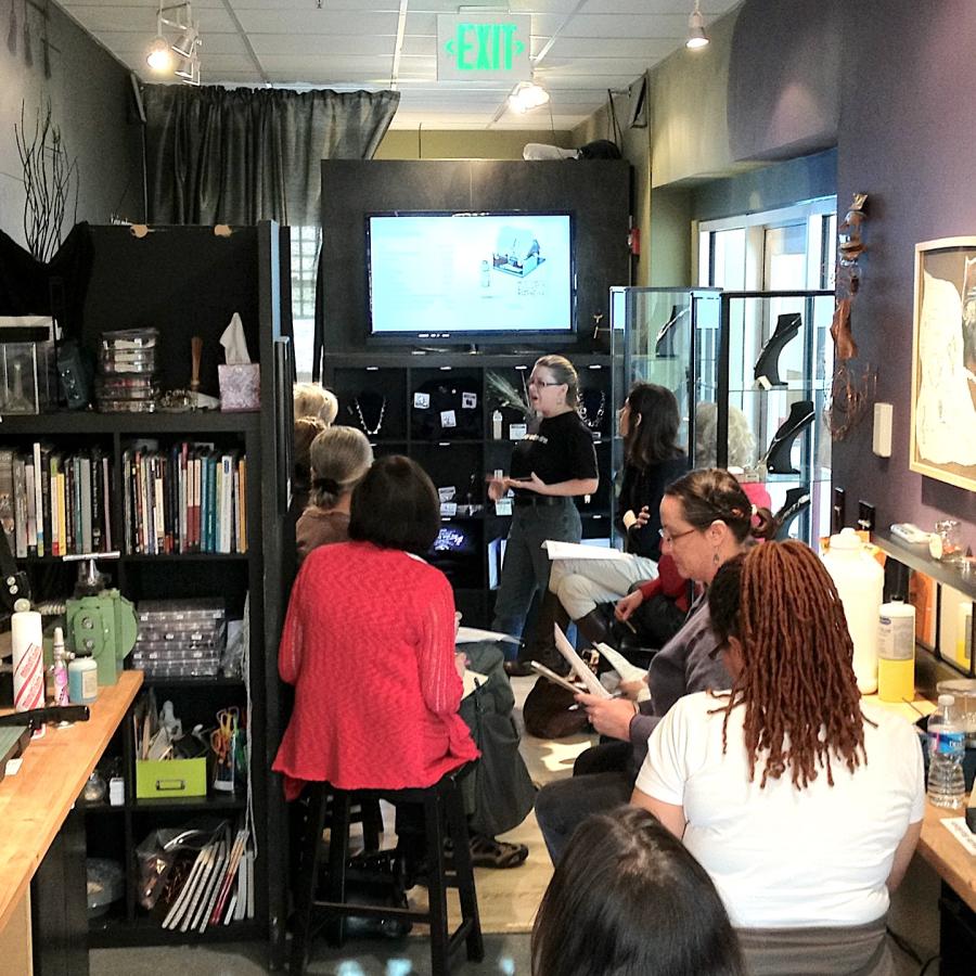 Students gathered in the studio listening to Blair