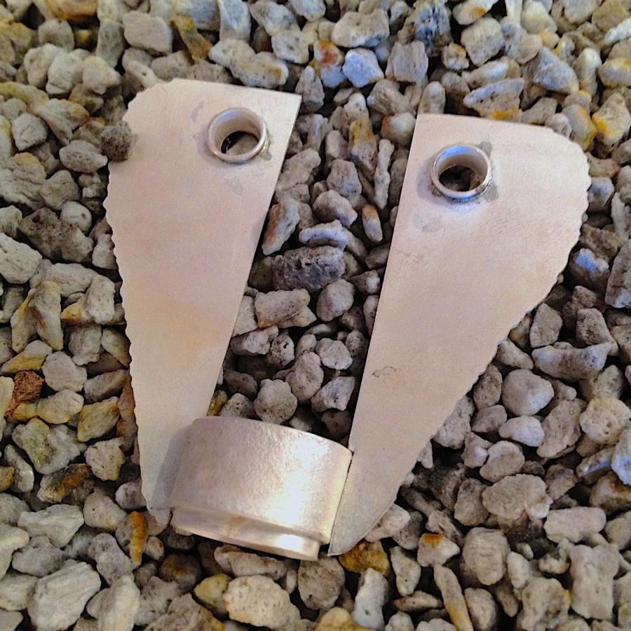 Assembling pieces of the pendant in solder pan pumice 