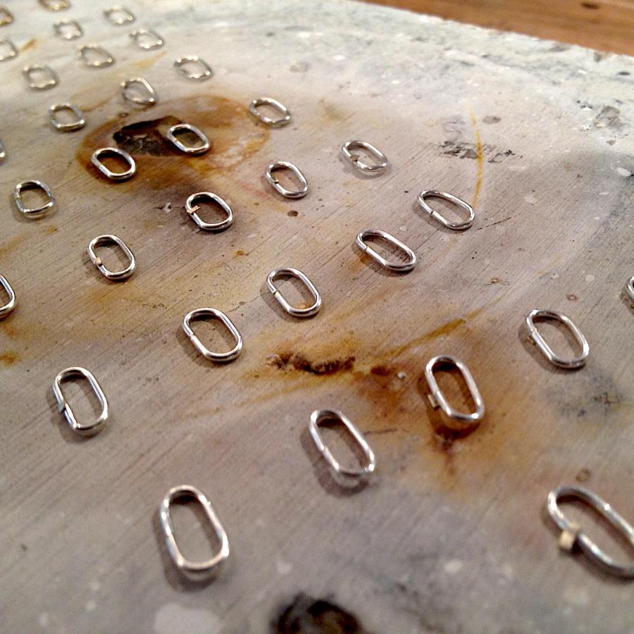 Links for the chain ready to be soldered