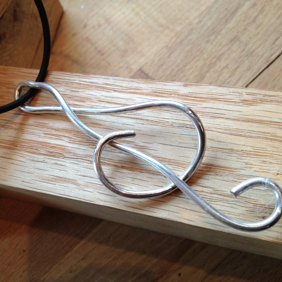 Treble clef pendant