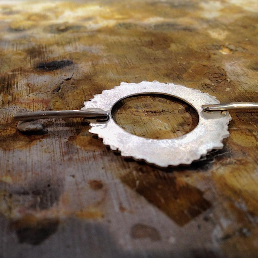 Staging the coin holder component for soldering