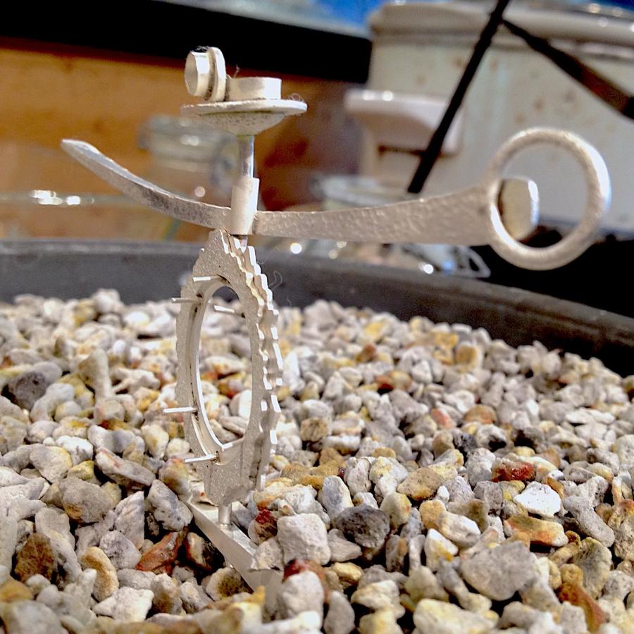 Staging the final soldering in pumice