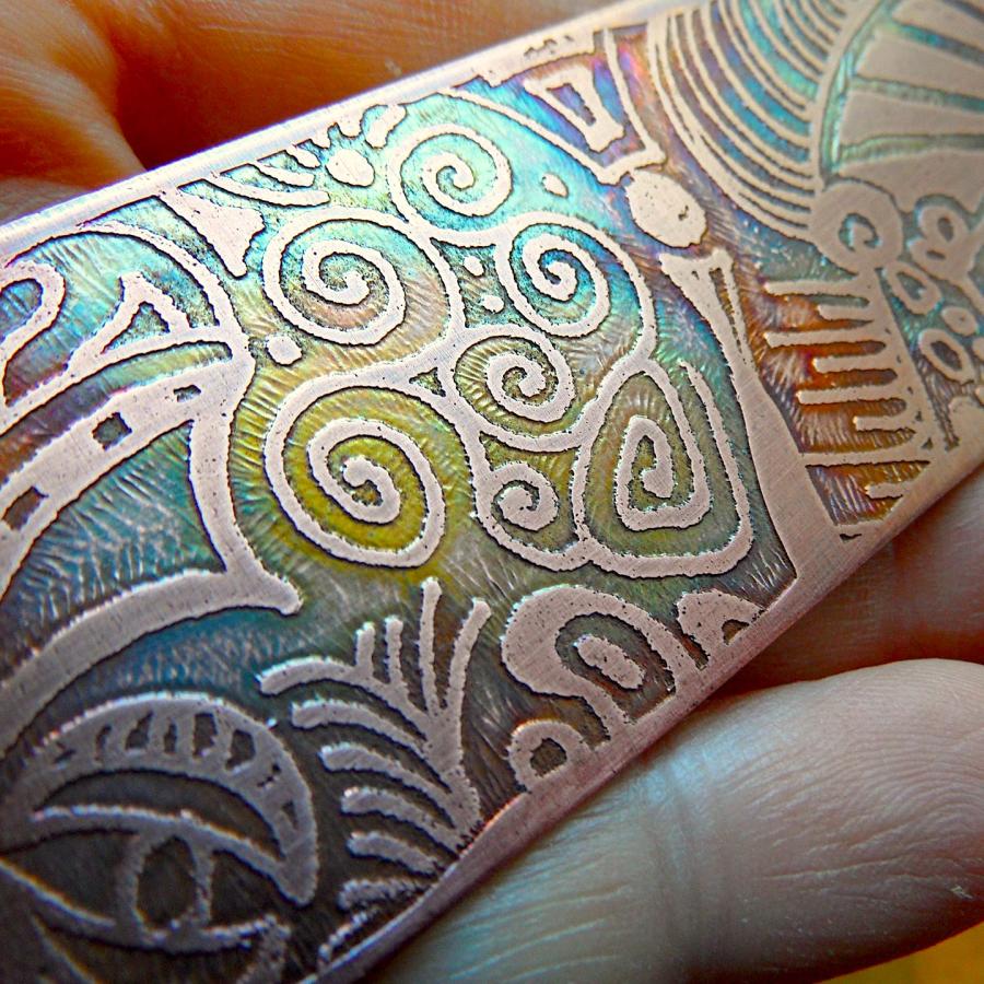 Copper sheet etched, with multi-colored patina, ready for forming