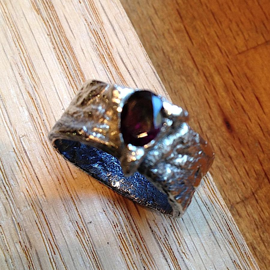 Student PMC ring with dark red gem
