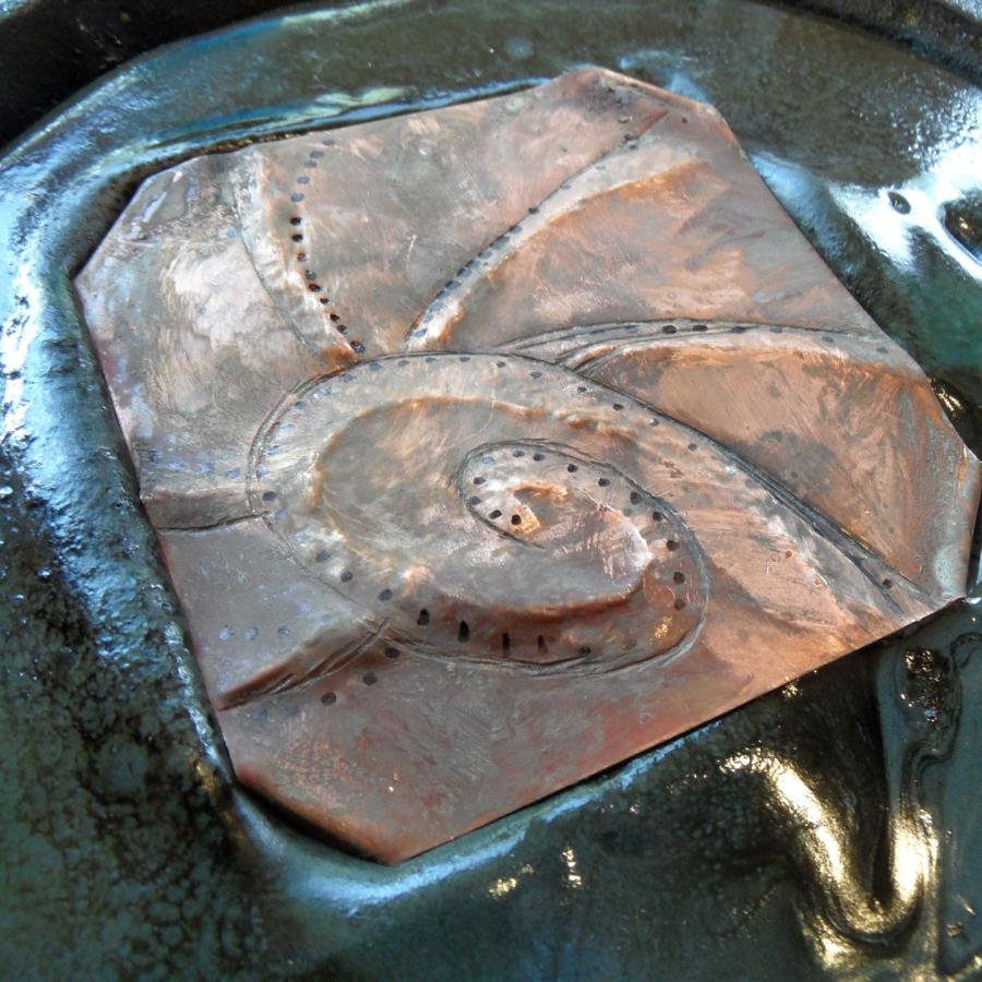 A copper panel in pitch by Mary