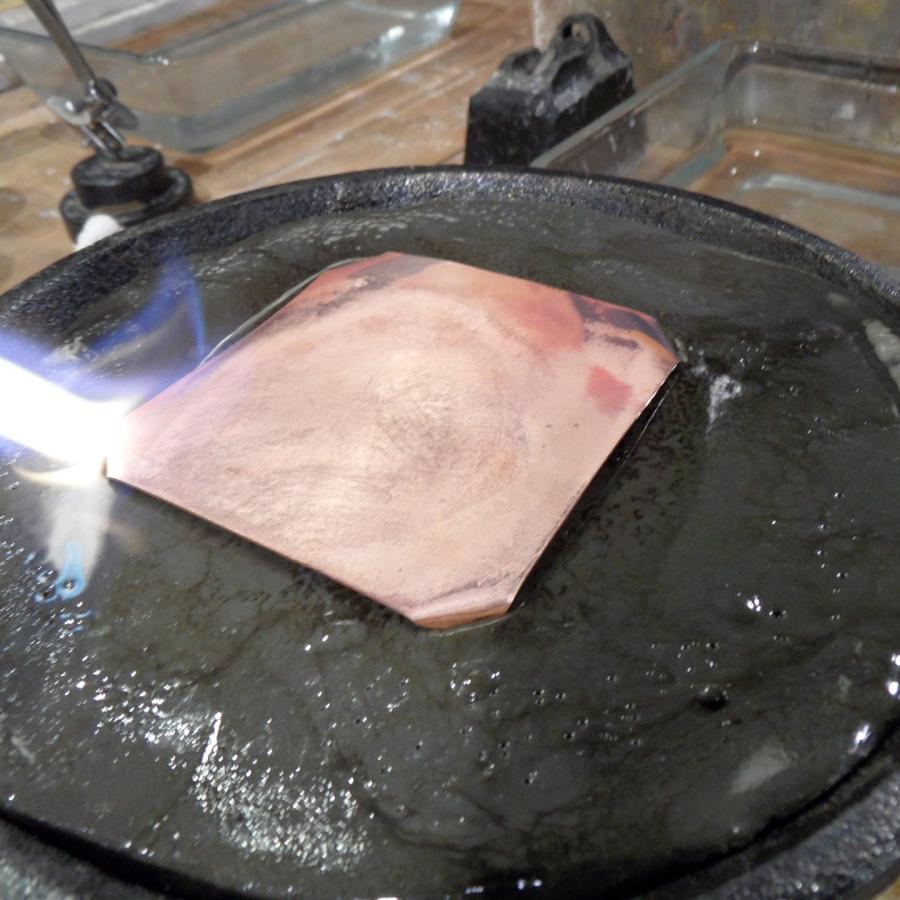 Preparing the pitch with torch