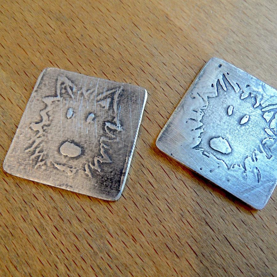 Etched puppy portraits on silver squares