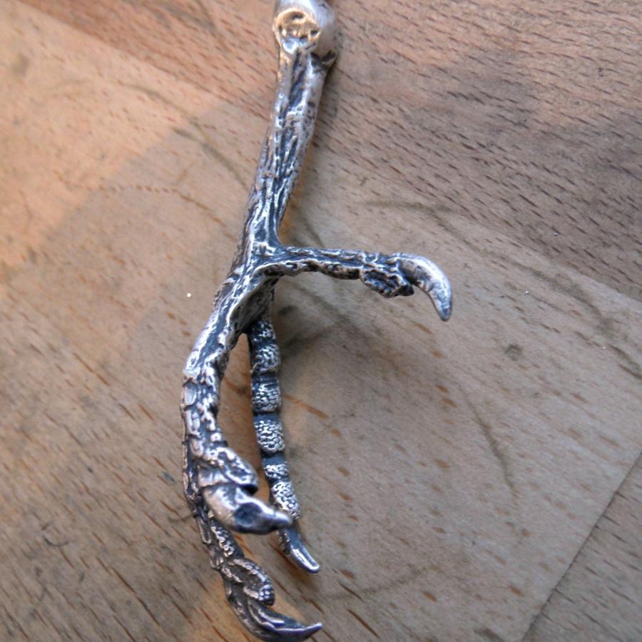 Allie's bird claw pendant