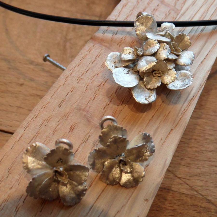 Kristi's pendant and earrings made from a succulent burned out directly