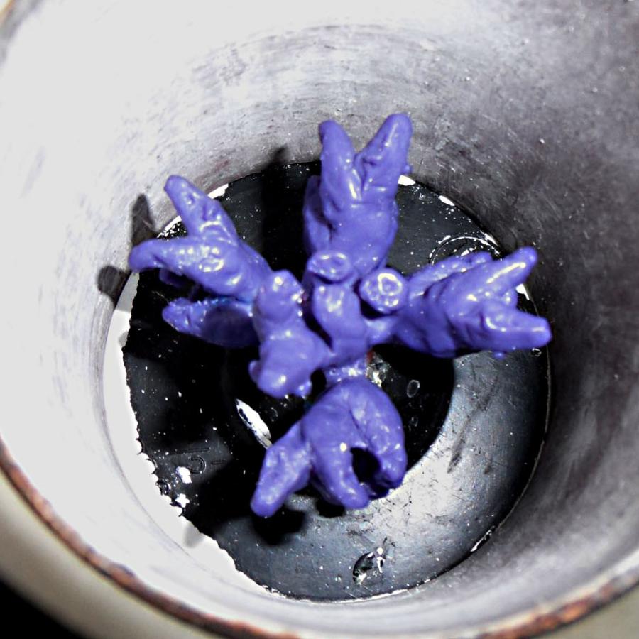 Wax tree of bears inside flask before burnout