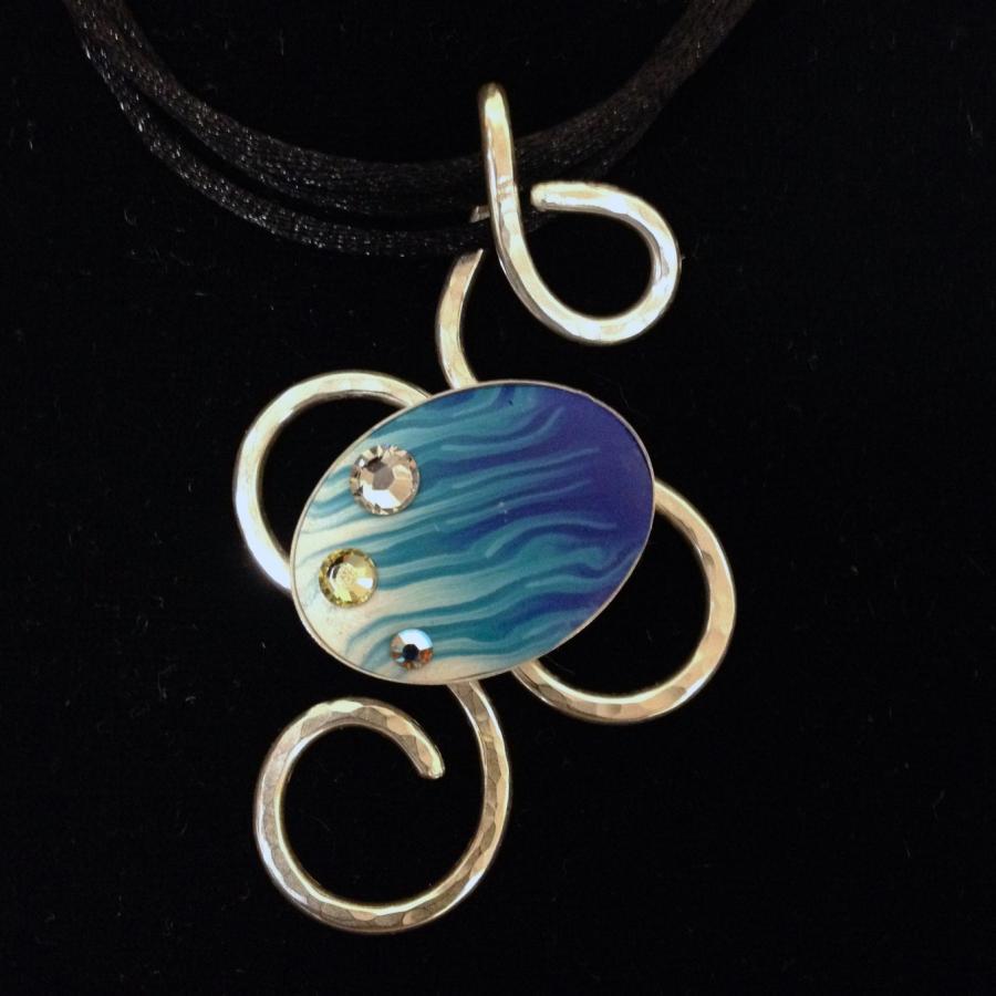 Blue patterned clay with gems set on twist silver pendant