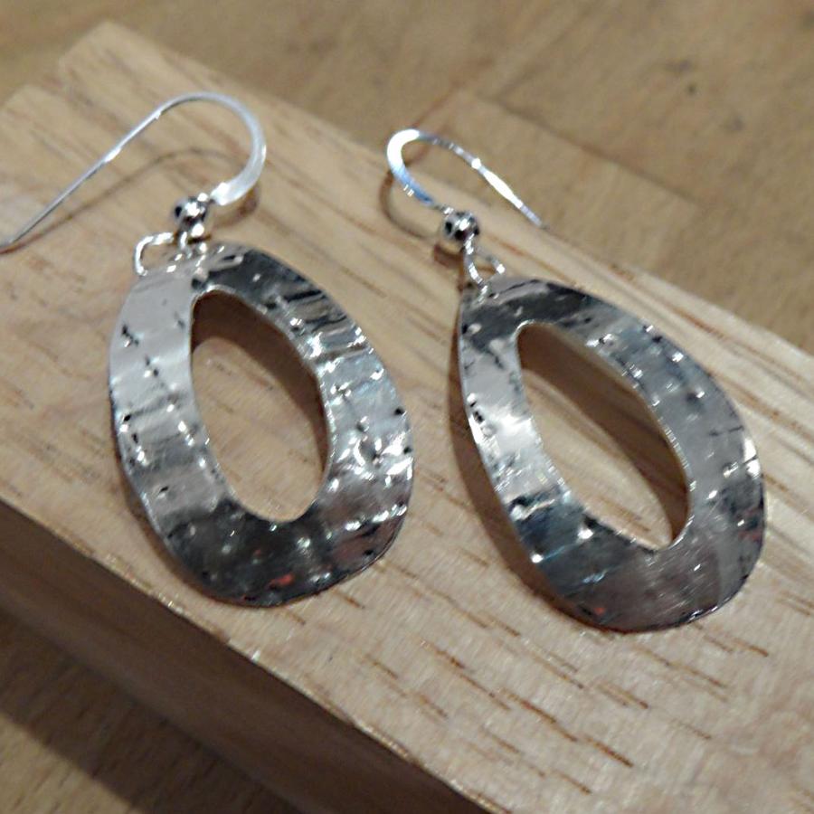 Textured silver oval earrings with oval opening