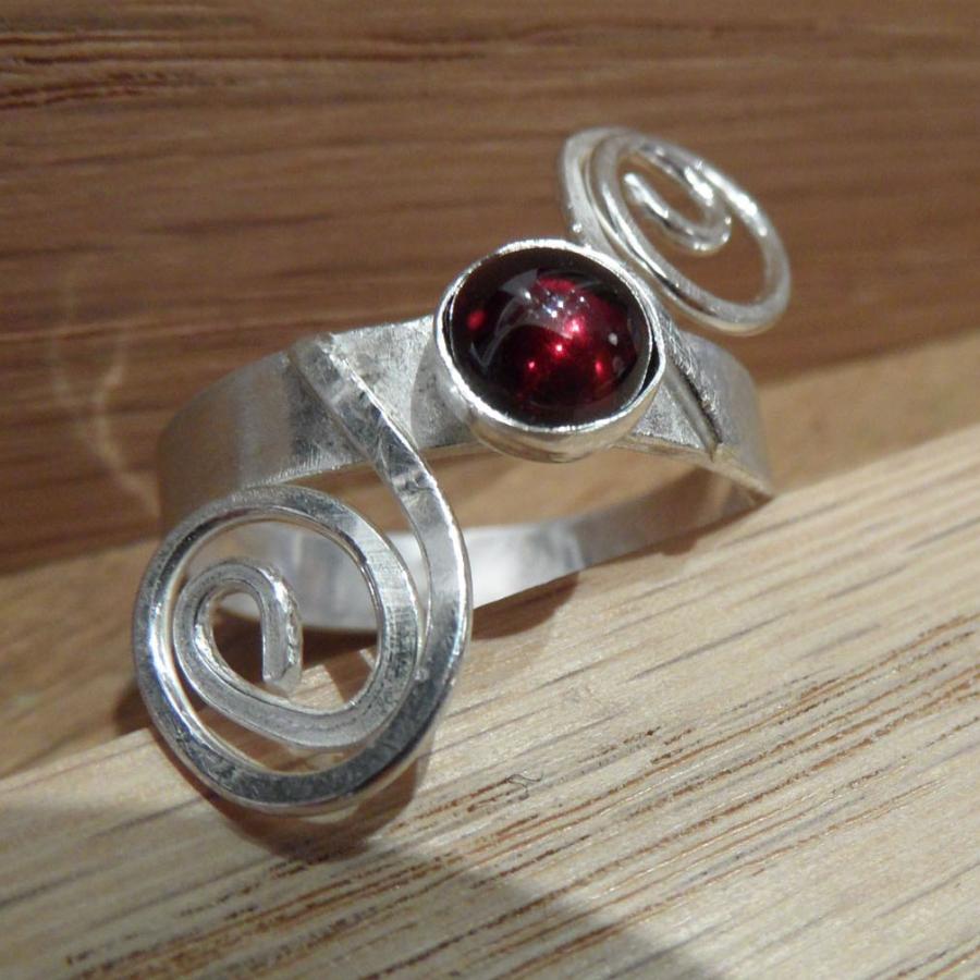 Silver garnet ring with spiraled wire 