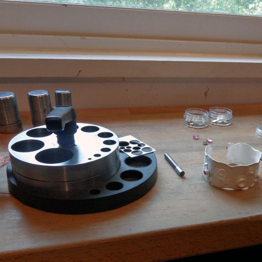 Disc cutter next to stones