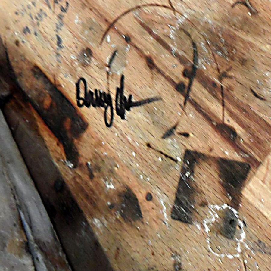 Burn mark on bench with Danny's signature
