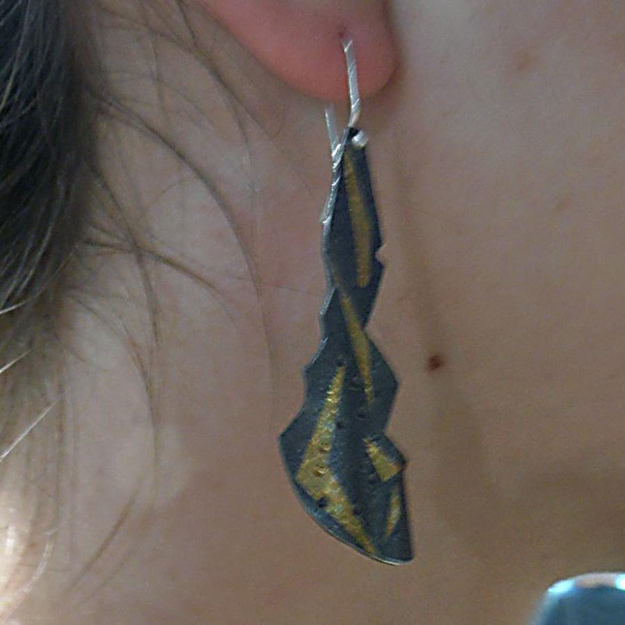 Kaila wearing her keum boo earrings 