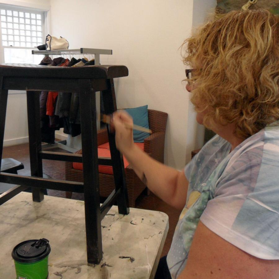Beth painting the bench stools black 