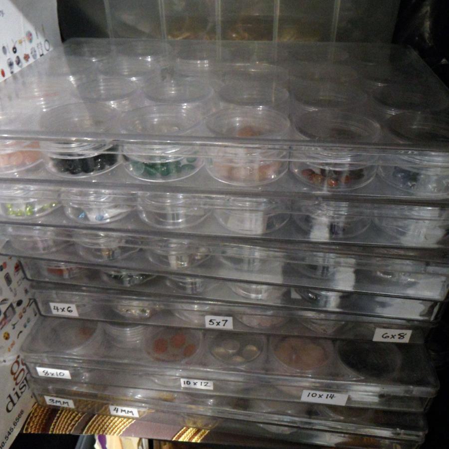 beading storage trays filled with small stones
