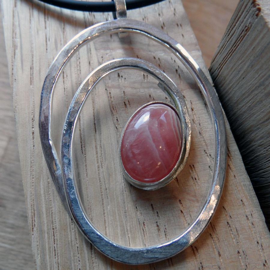 pink stone set on silver wire spiral pendant