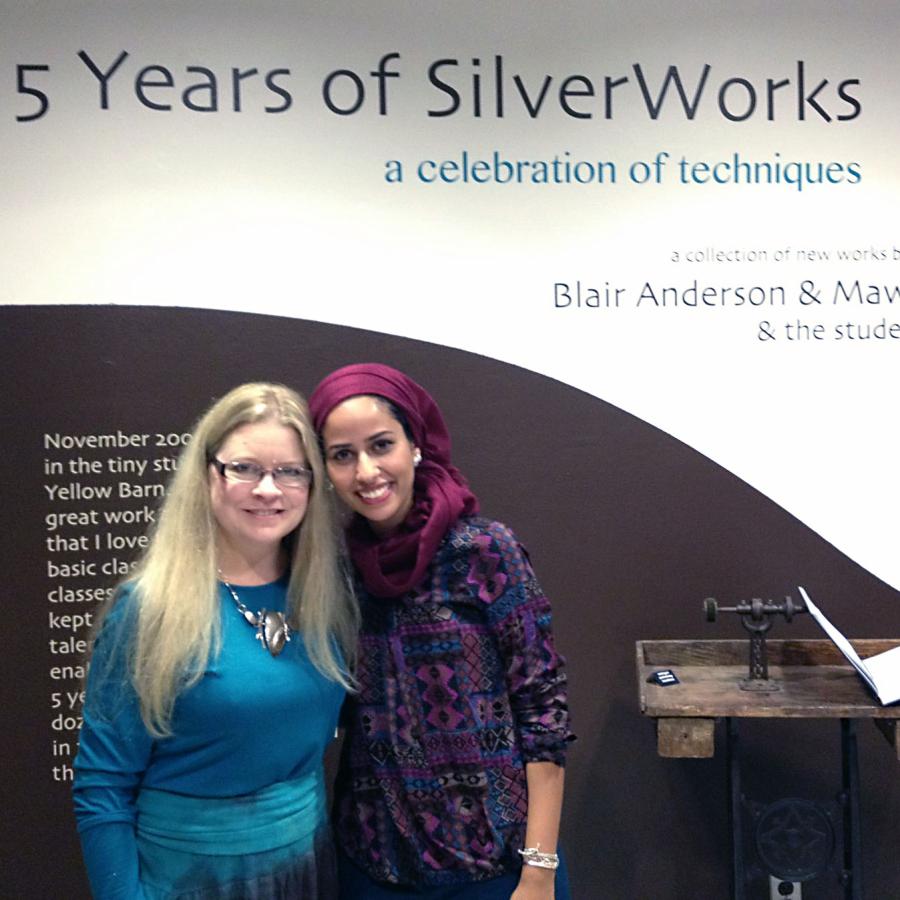 Blair and Mawadda by the title wall