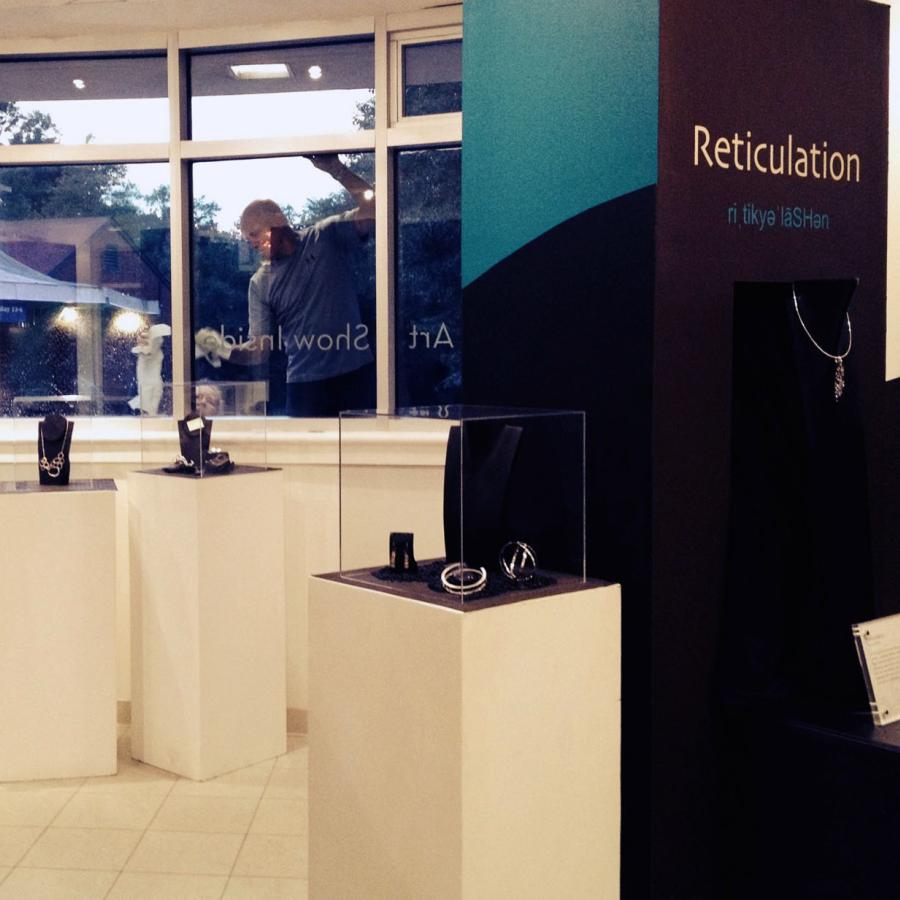 Peg and husband outside washing windows