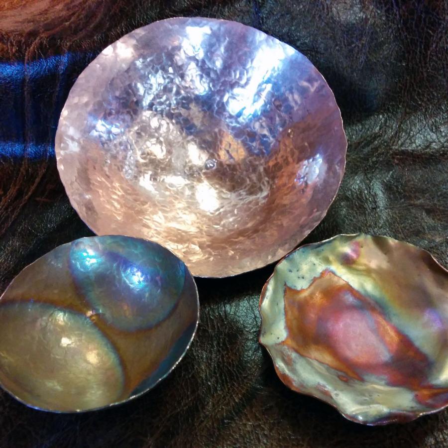 three formed and fire painted copper bowls