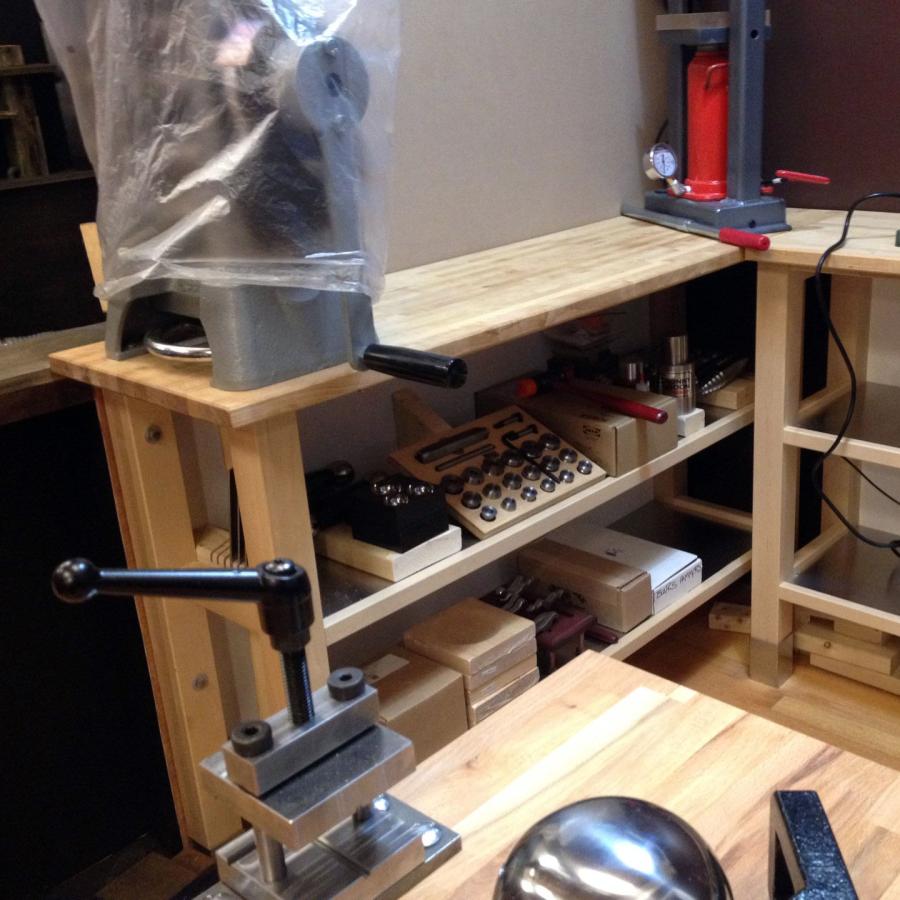 wooden shelves with new tools in the studio